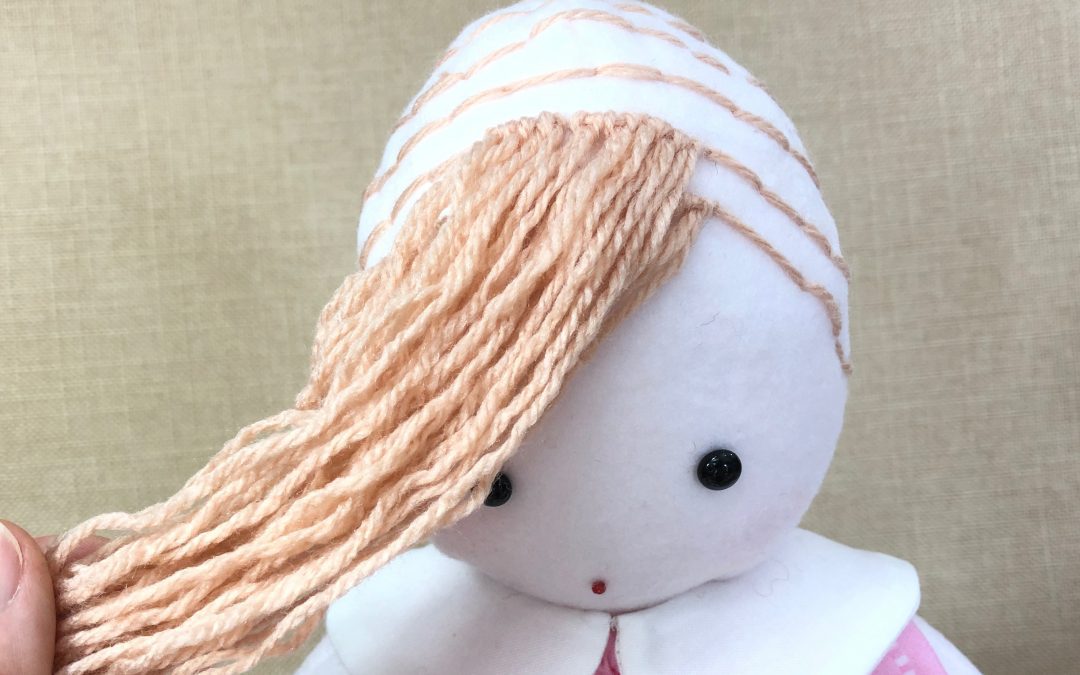 stuffed dolls with yarn hair